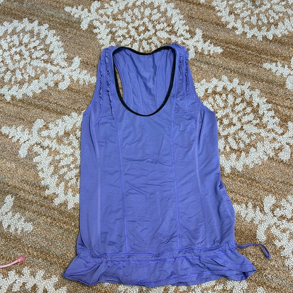 Lululemon size 4 purple tank top. ruffle down the back